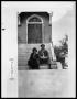 Photograph: Elderly Man and Woman on Church Steps