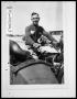 Photograph: Man in Military Uniform on Motorcycle