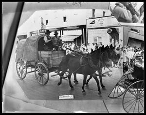 Primary view of object titled 'Horse Drawn Wagon in Parade'.