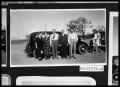 Photograph: Men and Women by Car