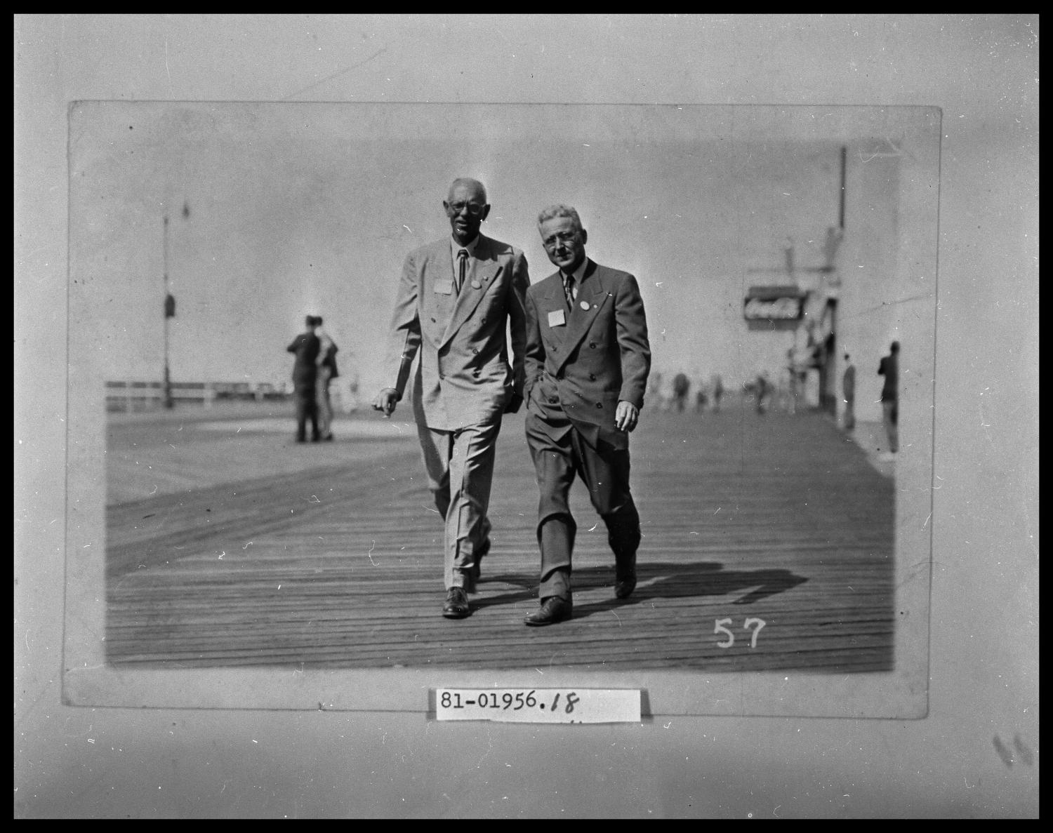 Men on Boardwalk
                                                
                                                    [Sequence #]: 1 of 1
                                                
