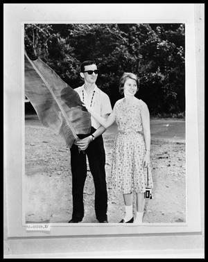 Primary view of object titled 'Man and Woman Holding Leaf'.