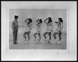 Photograph: Four Twirlers and Man