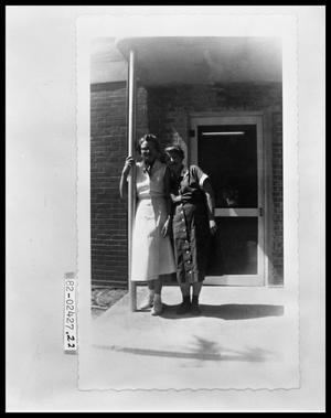 Two Ladies Standing Outside