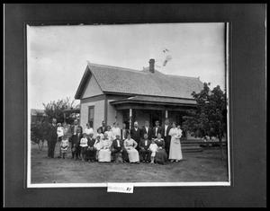 Primary view of object titled 'Large Family in Front of House'.