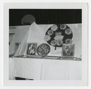 Primary view of object titled '[Display with Paintings and Hats]'.