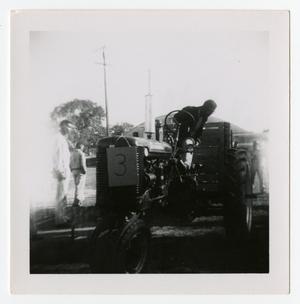 Primary view of object titled '[Man on a Tractor]'.
