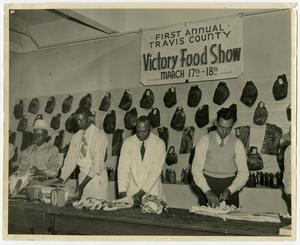 Primary view of object titled '[Men Butchering Meat at Victory Food Show]'.