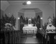 Photograph: [Photograph of the Interior of St. Mary's Catholic Church at Christma…