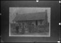 Primary view of [Photograph of a Family at a Farm House]