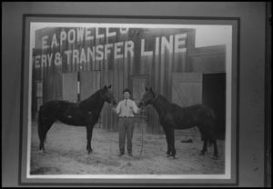 [Photograph of Everett Cline at Powell's Livery Stable]