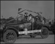 Thumbnail image of item number 1 in: '[Photograph of a Car in a Rodeo Parade]'.