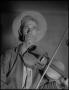 Thumbnail image of item number 1 in: '[Photograph of a Fiddler]'.