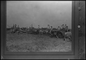 Primary view of object titled '[Photograph of Thresher and Workers]'.