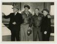 Photograph: [Photograph of Four Men in Control Tower]