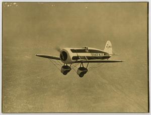Primary view of object titled '[Photograph of a Plane in Flight]'.