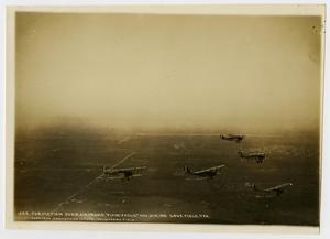 [Five Biplanes Flying in Formation]
