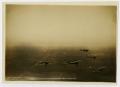 Photograph: [Five Biplanes Flying in Formation]