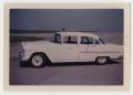 Photograph: [Side View of Chevrolet Continental Car]