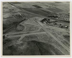 Primary view of object titled '[Aerial View of Planes Parked in a Field]'.