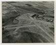 Thumbnail image of item number 1 in: '[Aerial View of Planes Parked in a Field]'.