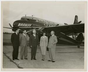 [Photograph of a Group in Front of Airplane]