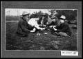 Photograph: Men Playing Cards Outdoors
