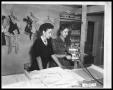 Photograph: Two Unknown Women at Cutting Table