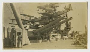 [Photograph of Airplanes and Guns on U.S.S. Texas]