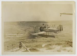 Primary view of object titled '[Photograph of a Plane Taking Off of U.S.S. Texas]'.