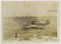 Thumbnail image of item number 1 in: '[Photograph of a Plane Taking Off of U.S.S. Texas]'.