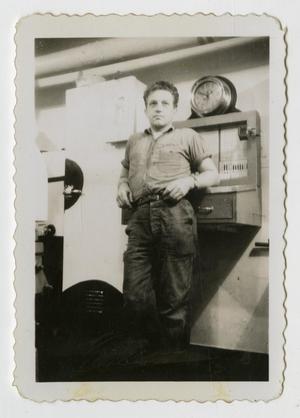 Primary view of object titled '[Photograph of Carl Kneer on U.S.S. Texas]'.