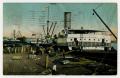 Postcard: [Postcard of Steamship Loading Cotton in New Orleans]
