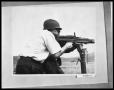 Photograph: Man Firing Machine Gun