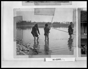 Three Asian Children Fishing
