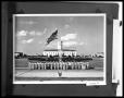 Photograph: Military Group Raising Flag