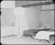 Photograph: [Two Cots in a Classroom]