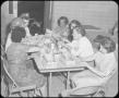 Photograph: [Women Sitting at Table]