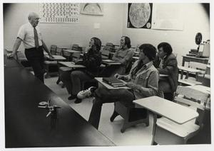 Primary view of object titled '[Dr. Virgil Bottom lecturing to his Physics students]'.