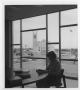 Photograph: [Photograph of Student Studying in Library]