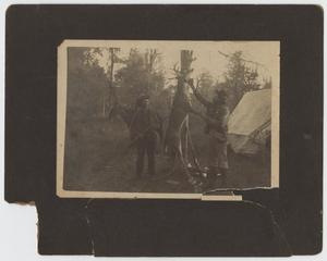 Primary view of object titled '[Photograph of Men and a Deer]'.