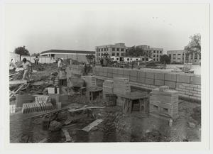 Primary view of [Photograph of Laying Blocks for the Mabee Dining Hall]