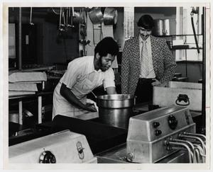 [Photograph of Men Working in Kitchen]