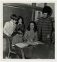 Photograph: [Photograph of Student Teacher Working with Children]