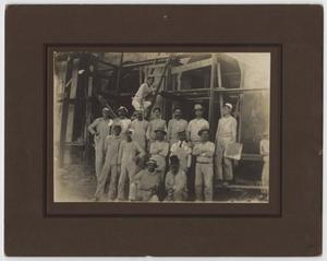 Primary view of object titled '[Photograph of Men at Entrance of Texas Cotton Palace]'.