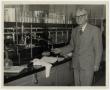 Photograph: [Photograph of Dr. Walter S. Long in Laboratory]