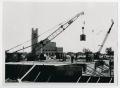 Thumbnail image of item number 1 in: '[Construction of Jay-Rollins Library with Two Cranes]'.