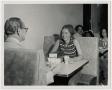 Thumbnail image of item number 1 in: '[Photograph of Couple in Cafeteria Booth]'.
