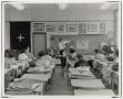 Primary view of [Photograph of Sherwood E. Suter Teaching Art Class]