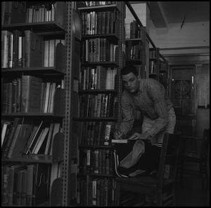 [Photograph of Male Student in Old McMurry Library]